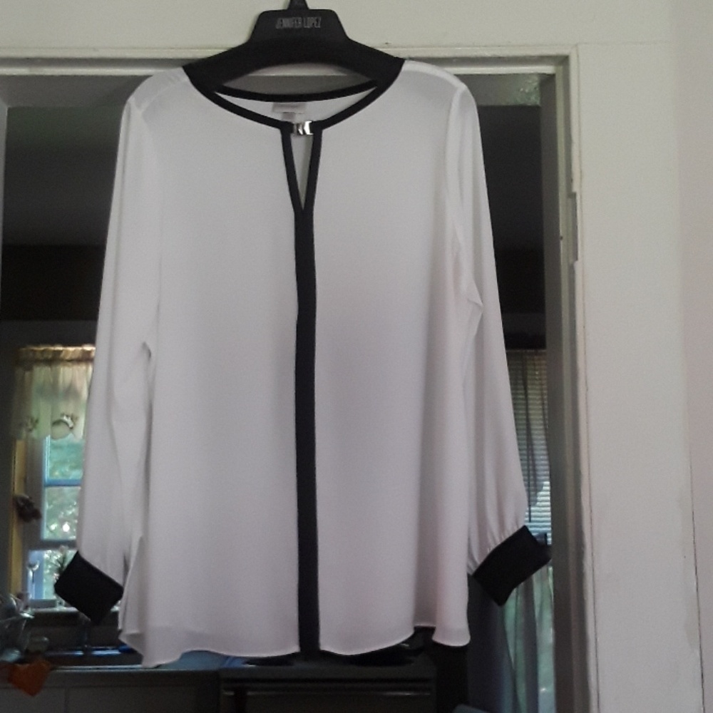 Woman's beautiful long sleeve top, worn once.